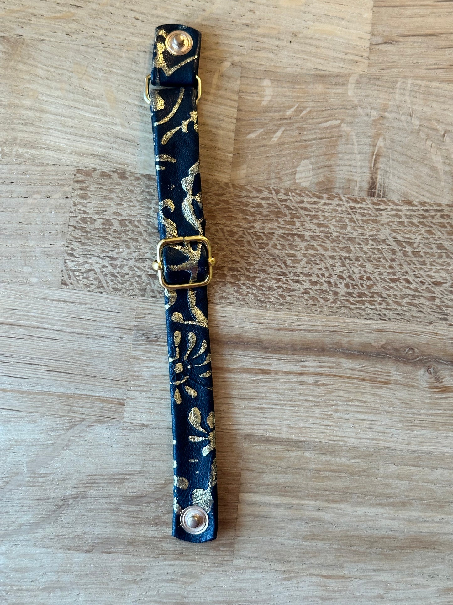 Læderrem guld/sort